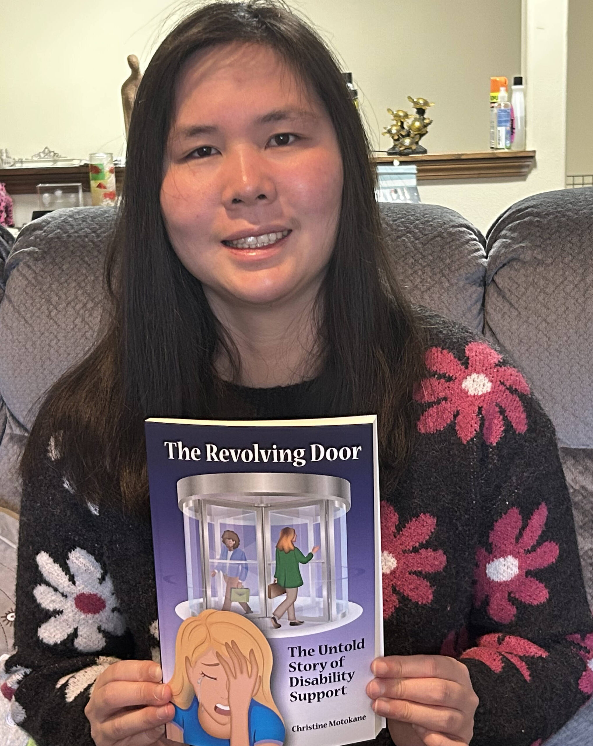 Helen Motokane courtesy photo
Christine Motokane pictured with her book  The Revolving Door: The Story of Disability Support.