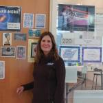 Cathy DeLorey stands outside of her classroom.