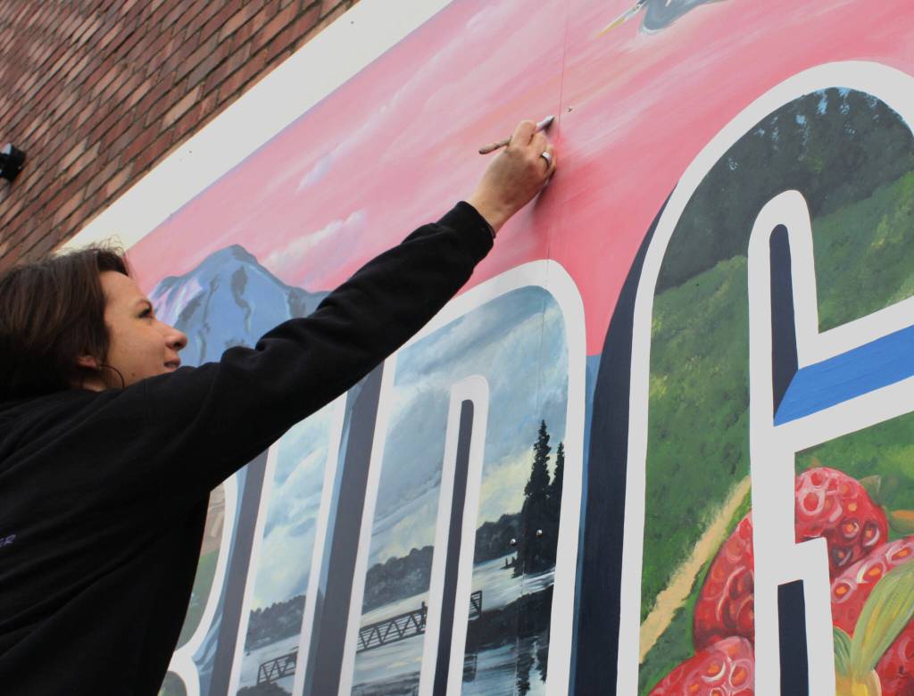 The mural is painted with regular exterior house paint, so its weather and graffiti-resistant.