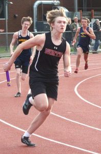 Luke Caputo/Kitsap News Group photos
Viking Eli Schlosser competes in a relay event in the NK track meet against Bainbridge March 24.