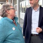 State Sen. Drew Hansen speaks with master gardener Ann Lovejoy after the Town Hall.