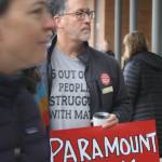 Many influential Bainbridge residents, including school boardmember Mark Emerson with sign, attended the meeting.