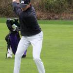 Spartan Anderson Wicklund hits his approach shot in a Bainbridge win over the North Kitsap Vikings March 27. He shot one over par through nine holes.