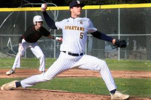Luke Caputo/Kitsap News Group photos
Spartan pitcher Trey Thompson strides down the mound to throw a pitch in a 10-0 win over the Kingston Buccaneers April 2 at Bainbridge High School.