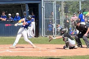 Luke Caputo/Kitsap News Group photos
Spartan Duncan Bos hits an incoming pitch in a 13-7 loss to the Jackson Timberwolves April 26 at Bainbridge High School.