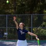 Luke Caputo/Kitsap News Group photos
Spartan Marta Llorens tosses the ball up for a serve in a 6-1, 6-2 doubles match win over North Kitsap April 30 at Bainbridge High School.