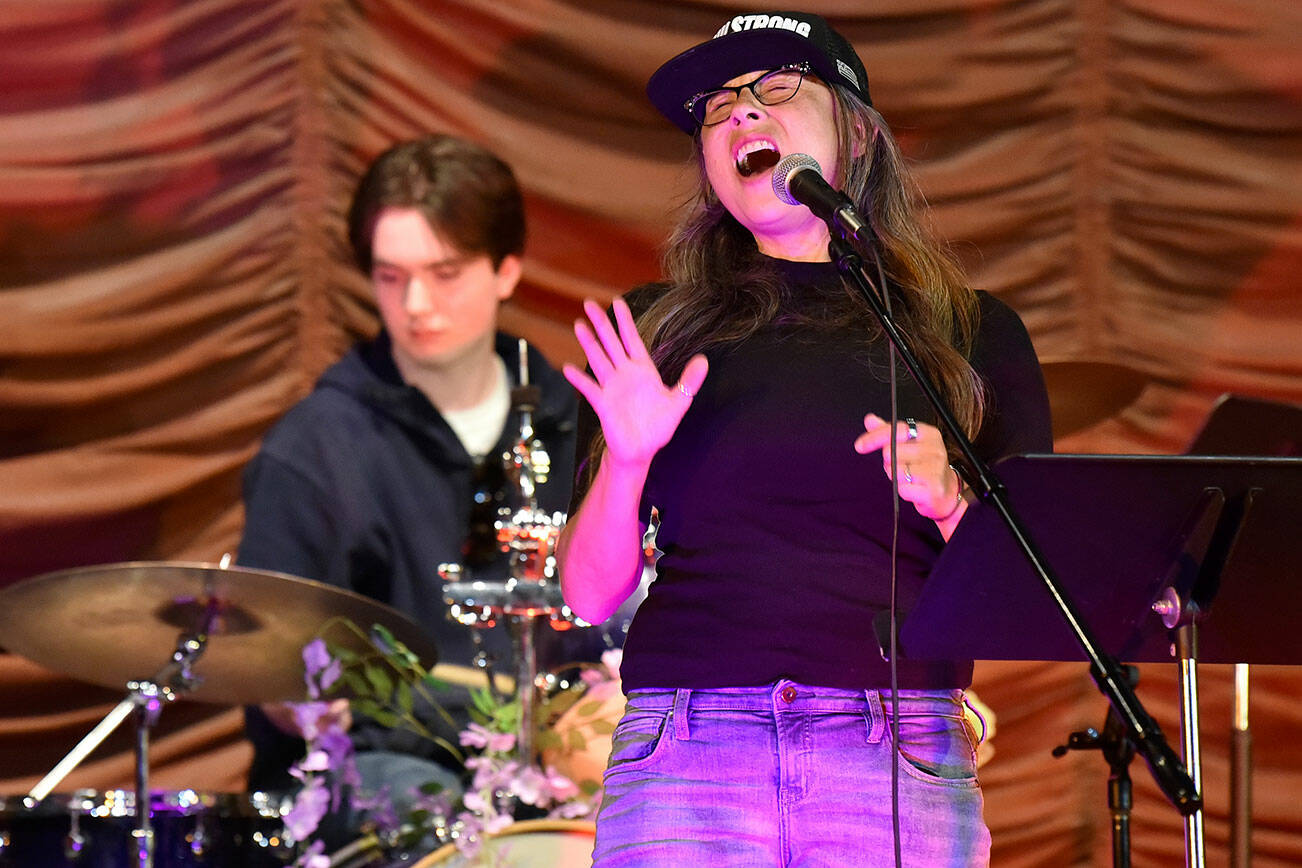 Local jazz vocalist Shannon Dowling sings during the Open Mic event.