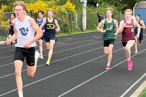 Luke Caputo/Kitsap News Group photos
Bremerton Knight Dallin Anderson leads the pack in a race at the Olympic League track and field championships May 8-10 at North Mason High School.
