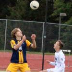 Spartan Zane Decker prepares to head the ball in a dominant Bainbridge win over Sequim in district play May 13.