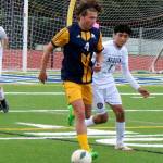 Luke Caputo/Kitsap News Group photos
Spartan August Peterson dribbles the ball in a 12-0 Bainbridge home win over Sequim in 2A district play May 13.