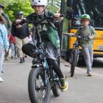 Ordway student Owen Leedle, front, and Jonathan Reiher, back, bike home from school May 16.