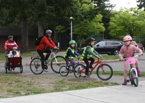 Molly Hetherwick/Kitsap News Group photos
Ordway Elementary students bike home from school along Danas Trail May 16.
