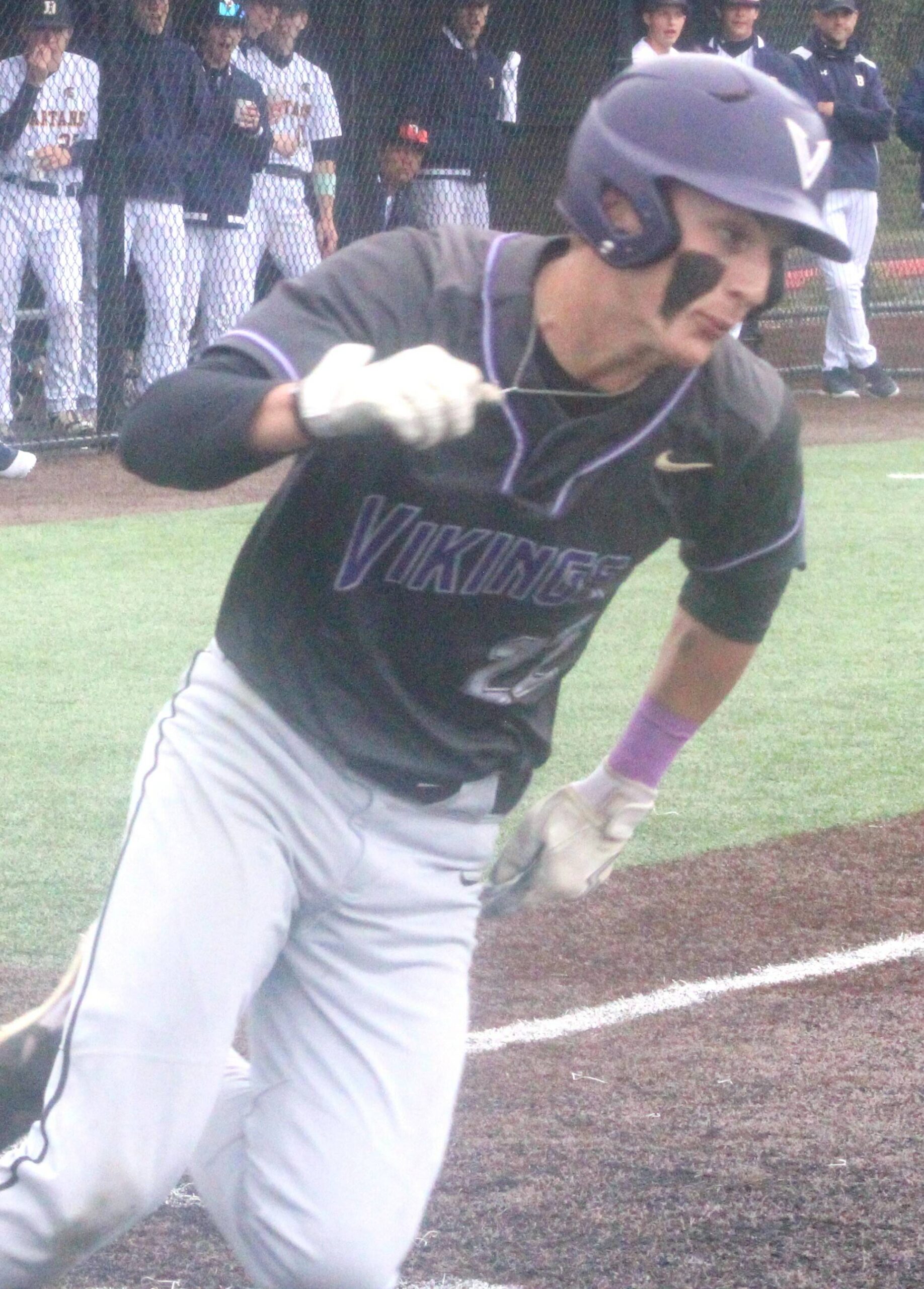 Viking Spencer Gillespie runs to first base in a 3-1 NK loss to Bainbridge May 17 in the district semifinals.