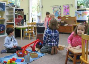 Molly Hetherwick/Kitsap News Group photos
Students Arthur Simpson (left) and two friends at Leaps and Bounds Montessori Preschool play together during project time.