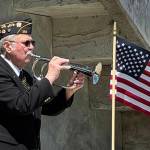 Richard Rosenthal courtesy photos
Mike Wilson of the American Legion Post 172 Color Guard plays Taps in honor of fallen service members at the Bainbridge Island Memorial Day observance May 26.
