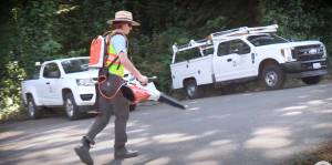 COBI courtesy photo
A city employee uses an electric-powered leaf blower.