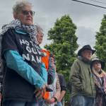 Anti-censorship protesters listen to speakers during the demonstration.