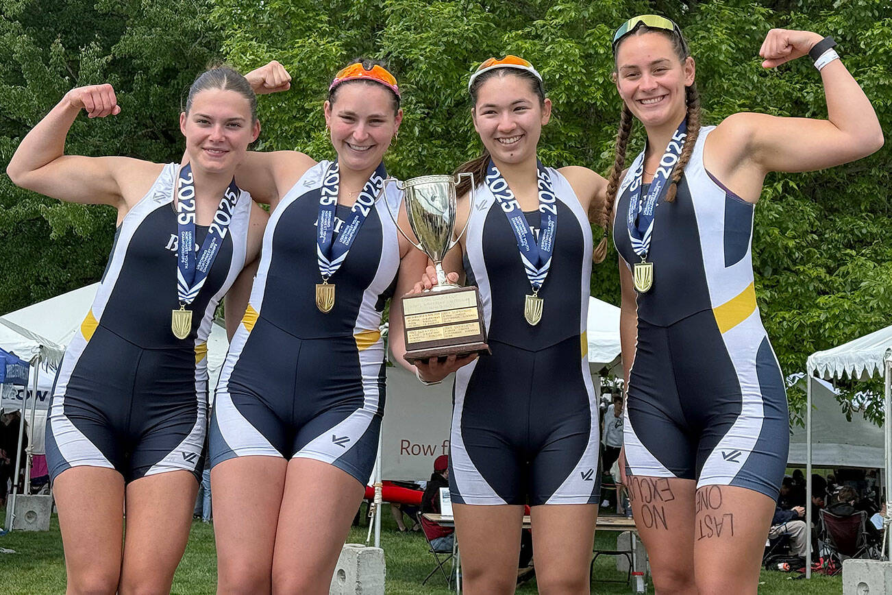 Dolly Courtway, Paige Murphy, Alita Kakutani, and Addie Carleton of BI Rowing posing after their first-place finish in the Pacific Northwest Regional Championships May 28 in Vancouver, WA.