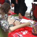 Community members were invited to contribute their own family lineage to a multicultural tapestry.