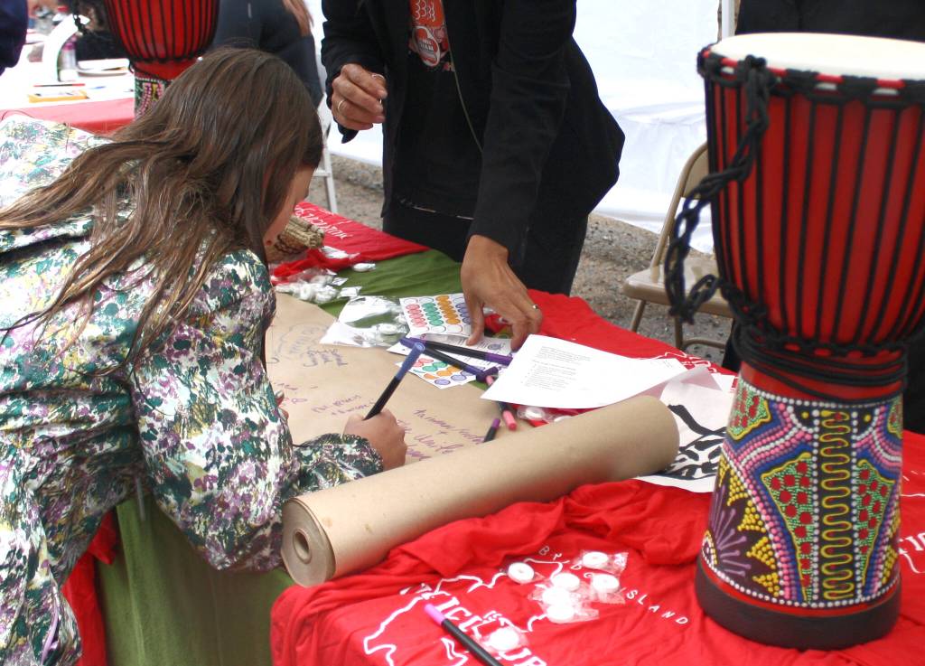 Community members were invited to contribute their own family lineage to a multicultural tapestry.
