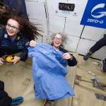 Hyla courtesy photos
Caroline Little (middle) holds up a Hyla shirt during a period of microgravity on a parabolic flight.