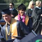 Jazz Epstein smiles after receiving his diploma.