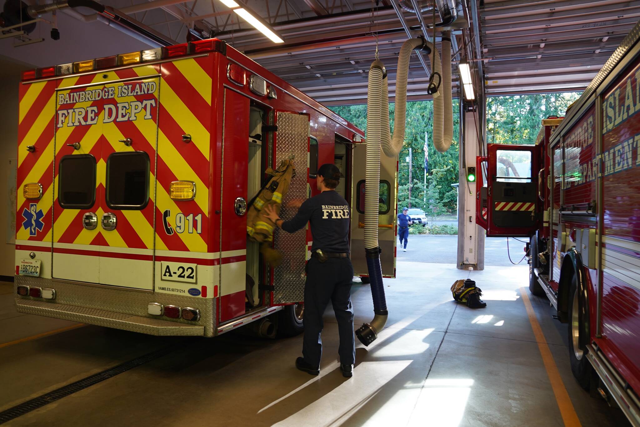 Joshua Kornfeld/Kitsap News Group
BI firefighters/EMTs rush to a medical call from Station 22.