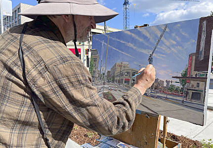 BIMA courtesy photo
Artist Michael Stasinos works on a painting.
