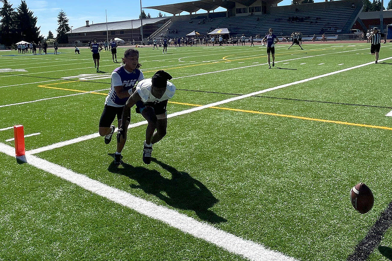 North Kitsap defensive back Kyrie McGinty plays tight defense on a Stadium wide receiver during the 7 on 7 tournament July 12 at Bainbridge High School.