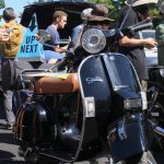 The vehicle auction drew much attention, particularly for the deals available to shoppers. This Vespa scooter had only 57 miles on the odometer.