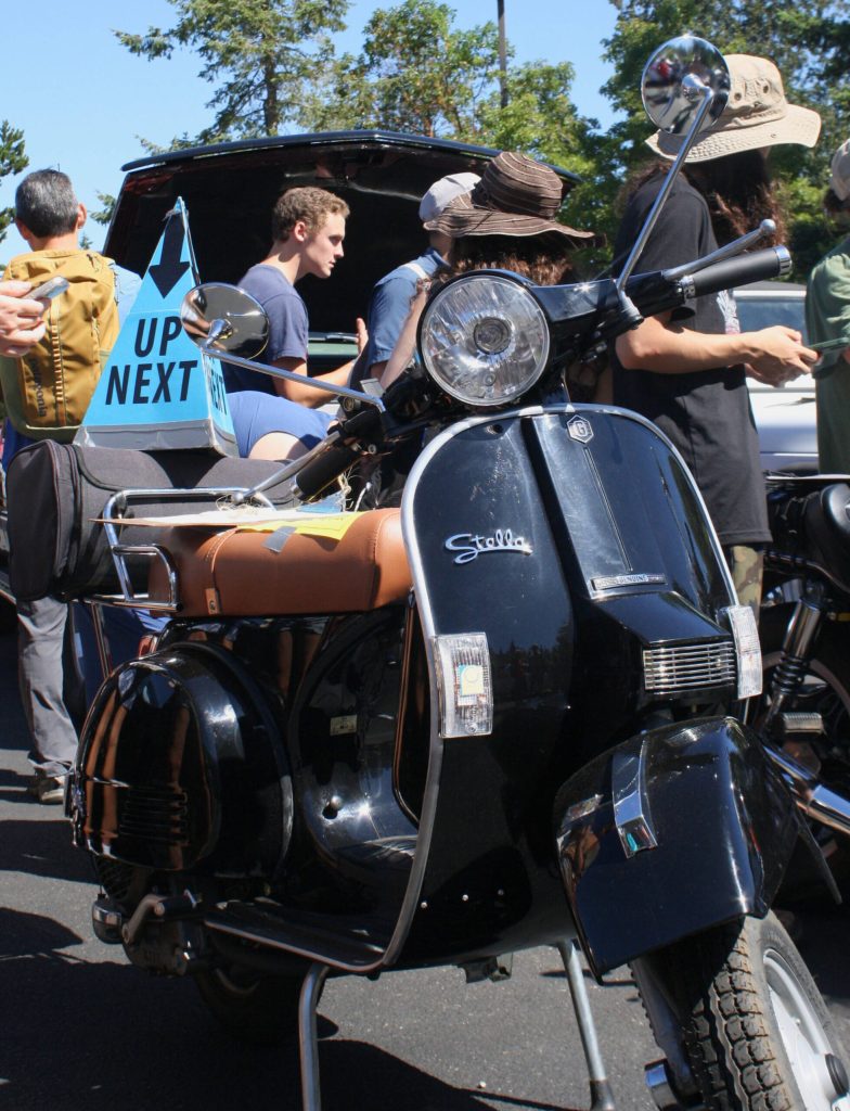 The vehicle auction drew much attention, particularly for the deals available to shoppers. This Vespa scooter had only 57 miles on the odometer.