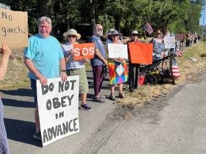 Greg Relaford courtesy photo
Community members line Highway 305 on Bainbridge Island to participate in the Day of Action demonstration July 17.