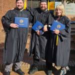 Emile Stettler courtesy photos
Cybersecurity club members Robert Jesnionowski (left), Emile Stettler and Lauren Hall hold their diplomas at commencement.