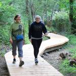 BI Parks & Trails Foundation courtesy photo
Community members stroll the boardwalk at Sunny Hill to Nutes Pond Trail.