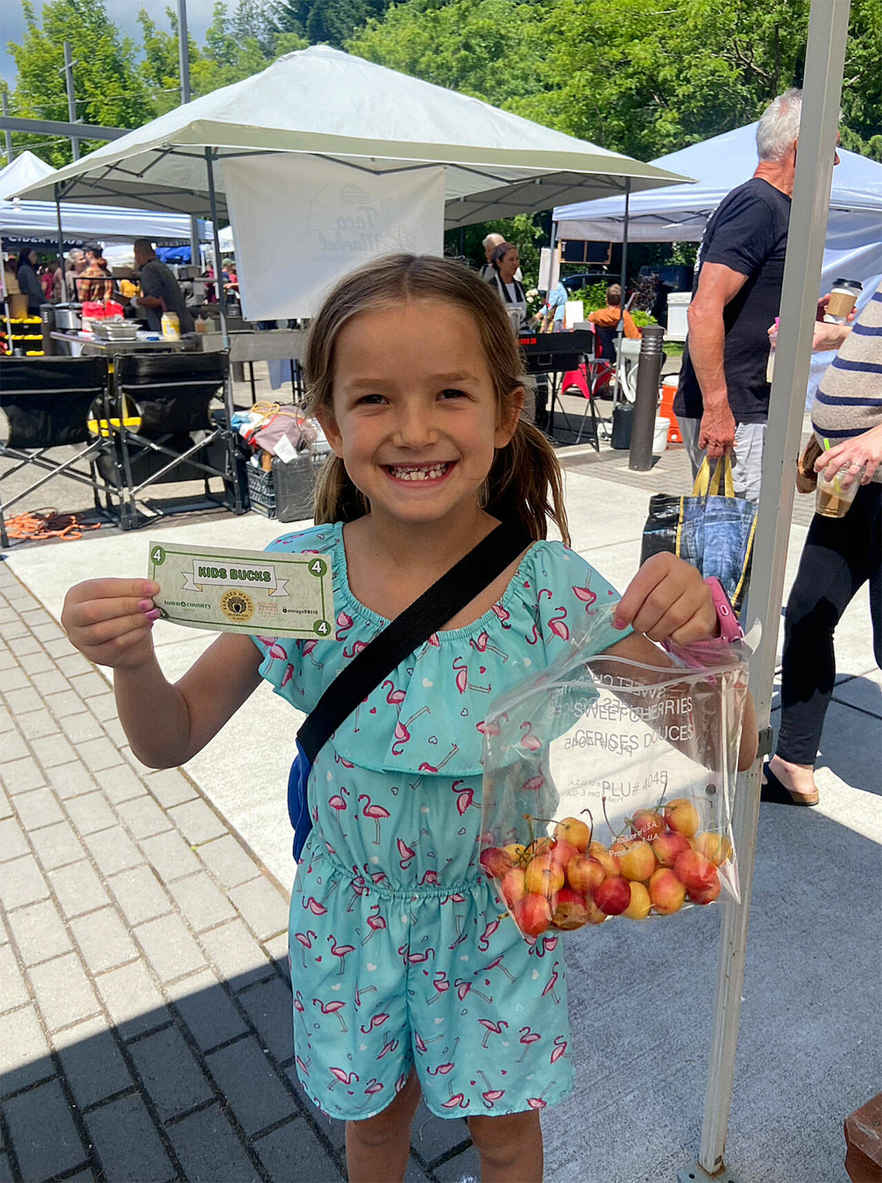 Children used Kids Bucks to purchase produce from the market.