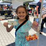 Children used Kids Bucks to purchase produce from the market.