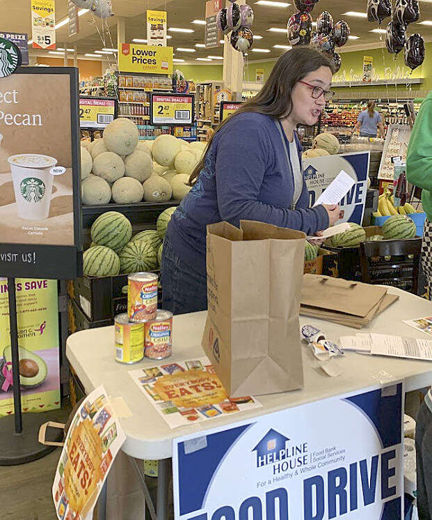Rose Untalaseo volunteers with the Everybody Eats Food Drive.