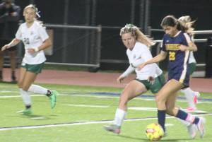 Luke Caputo/Kitsap News Group photos
Spartan Taylor Mass attempts to dribble around a PA defender in a 2-0 Bainbridge home win over the Roughriders Oct. 9.