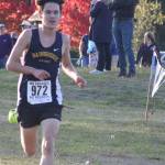 Luke Caputo/Kitsap News Group photos
Spartan Ryan Dodge crosses the finish line in the boys 5K event, placing first in the Olympic League Cross Country meet at Battle Point Park on Bainbridge Island Oct. 15.