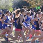 Female runners from multiple Kitsap County teams compete in the girls 5K event in the Olympic League Cross Country meet at Battle Hill Park on Bainbridge Island Oct. 15.