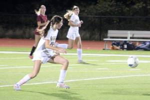 Luke Caputo/Kitsap News Group photos
Spartan Taylor Mass goes after the ball with fellow Spartan Abril Edwards and Buccaneer Paiton Leibold looking on in a 6-0 Baibridge road win over Kingston Oct. 21.