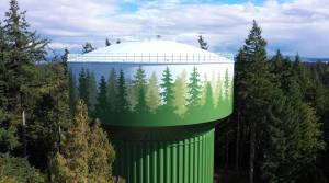 COBI courtesy photo
The new Winslow Water Tank, featuring art of evergreen trees.