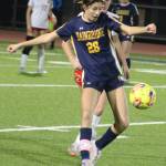 Spartan Taylor Mass possesses the ball with a Steilacoom defender right behind her in a 3-1 Bainbridge home win over the Steilacoom Sentinels Nov. 8 in the District 3 2A girls soccer championship.