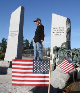 Molly Hetherwick/Kitsap News Group photos
Gary Sakuma, a U.S. Air Force veteran and commander of the BIs American Legion Post, describes the significance of the World War II Memorial at Bainbridge High School.