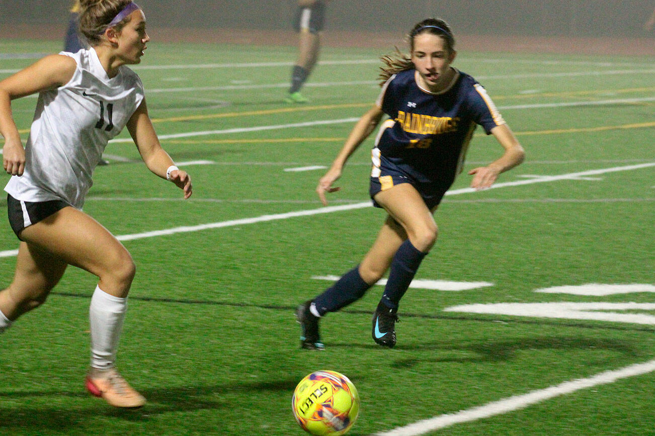Spartan Vega Hendrickson pursues the ball in a 4-3 Bainbridge home loss to the Anacortes Seahawks in the quarterfinals of the 2A girls state soccer tournament Nov. 15.