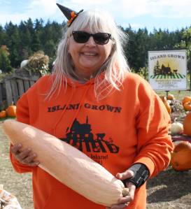 File photo
Shana Wadsworth Ramirez, Suyematsu Farms manager, holds a banana squash.