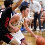 Spartan Ryan Rohrbacher drives to the hoop in a 64-58 Bainbridge home win against Palm Springs Dec. 3.