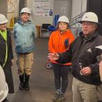 Tim Clancy, operations manager at Eagle Harbor Maintenance Facility, recounts a king tide flooding incident at the facility in 2022 that covered the entire ground floor of the structure with several inches of water.