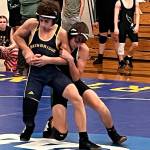 Spartan Victor Peña attempts to break free from a potential pin during a meet Dec. 11 at Bainbridge High School.