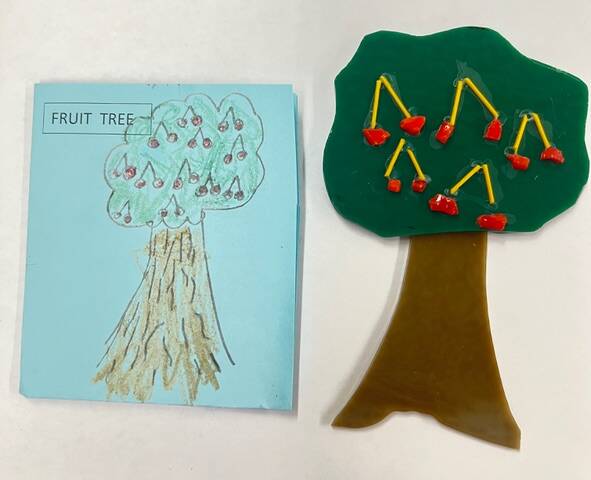 Some students made parts of their environment that represent Yakima, like fruit trees.